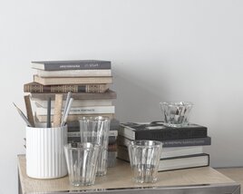 Stack of Books and Glassware on Shelf Modello 3D