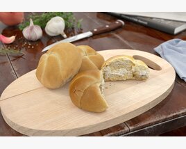Freshly Baked Bread on Cutting Board Modello 3D